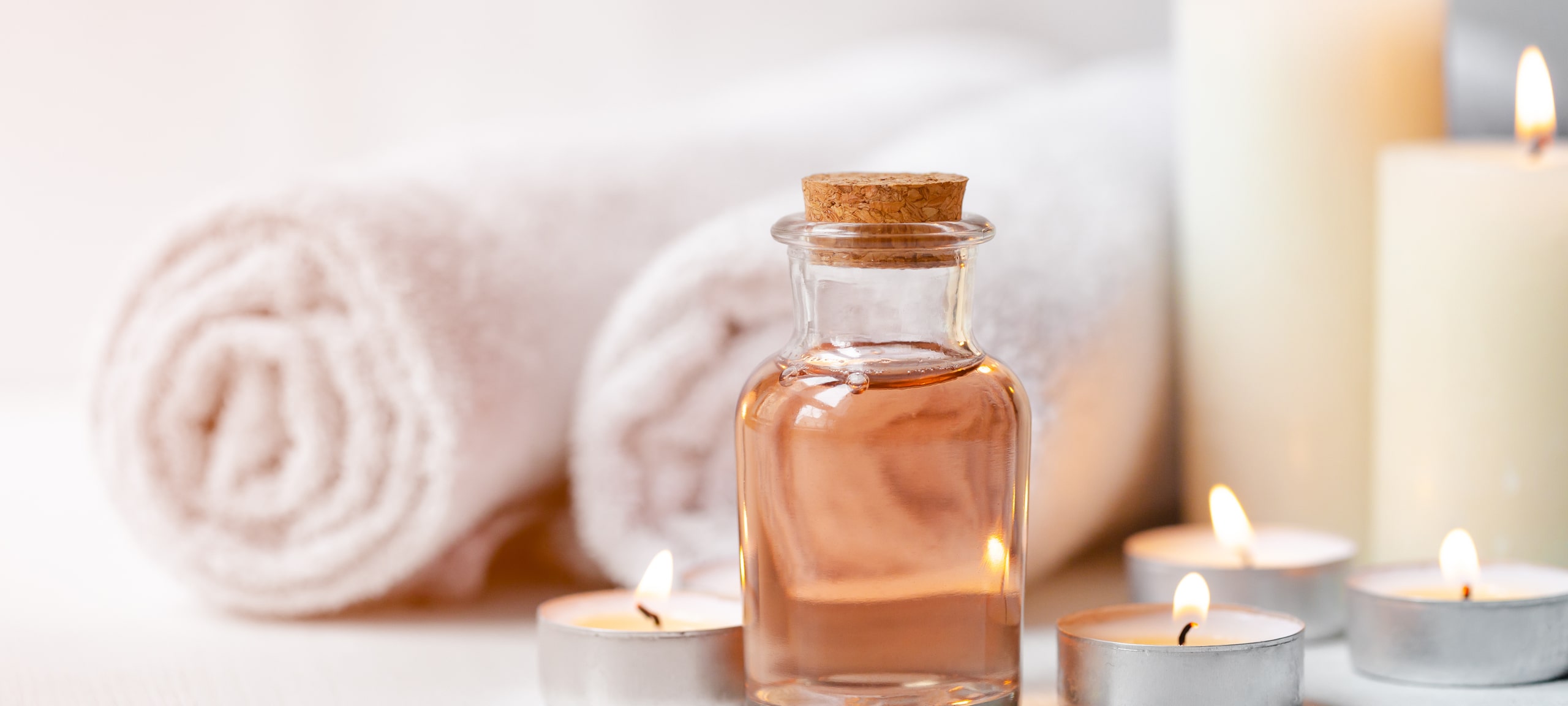 Candles, towels, and oil at a day spa
